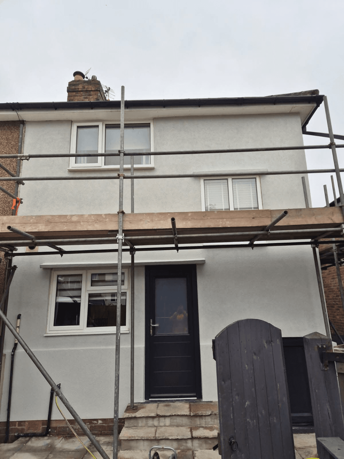 Full house render with scaffolding